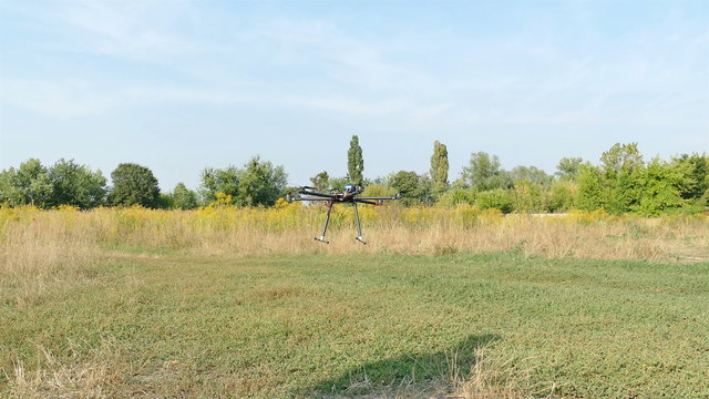 

Drone fly and landing on grass   .4K 3840x2160
