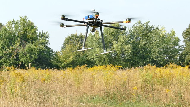 Drone fly and landing on grass   .4K 3840x2160
