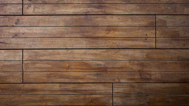 close-up image of aged wooden floor in building