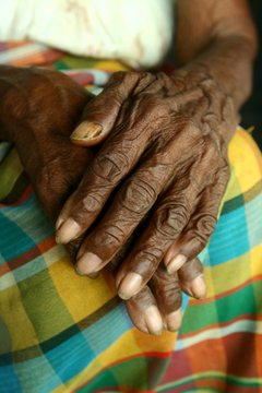 Wrinkled pair of hands of an old woman