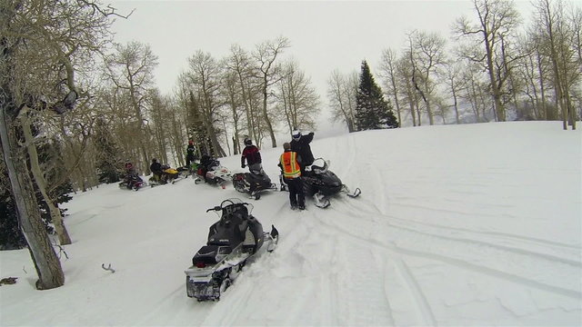 Snowmobile club friends on top of forest winter mountain HD 003