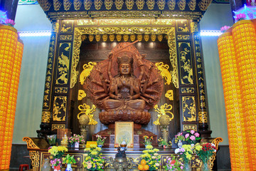Wood carving of the thousand hand buddha