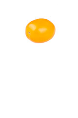 Yellow cherry tomato on white background