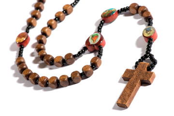 Roman Catholic rosary on white