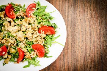 Salad with Tomatoes, Mushrooms, Arugula and Sunflower Seeds
