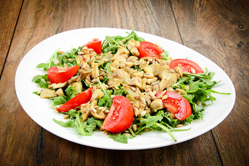 Salad with Tomatoes, Mushrooms, Arugula and Sunflower Seeds