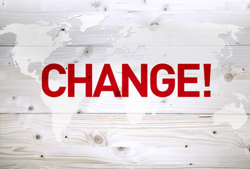 Change article on world map wooden background