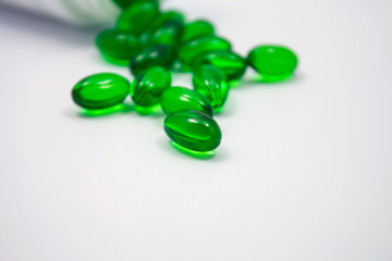 soft gel capsule vitamins pills in green color