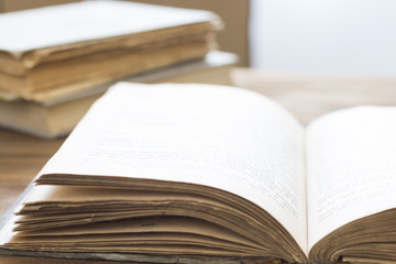 open old book on wooden table