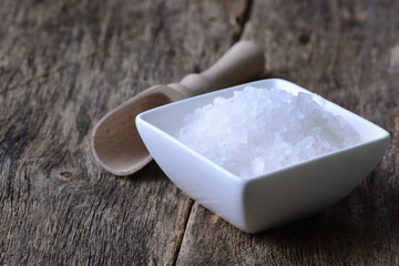 Closeup of salt on wooden table