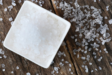 Closeup of salt on wooden table
