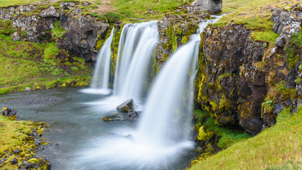 Fototapeta na wymiar Waterfall at Kirkjufell mountain, Iceland