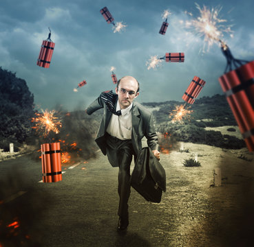 Man escaping from dynamite exploding