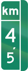 Guide and information road sign in Quebec, Canada - Milestone sign with distance in kilometers, version for the right side of the road