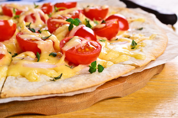 Flat tortilla with cheese and vegetables