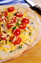 Flat tortilla with cheese and vegetables