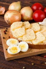 Healthy quail eggs and bread with romadur cheese