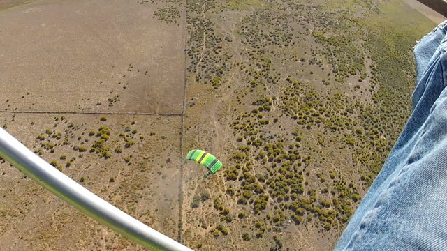Ultralight parachute flying from above HD 023