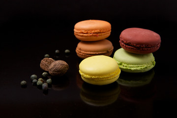 Macaroons on black surface