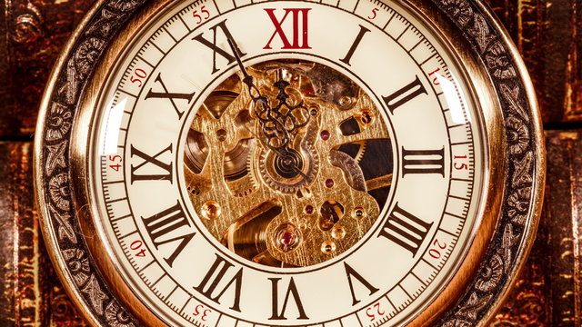 Antique clock dial close-up. Vintage pocket watch.