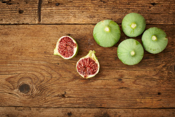 fresh figs on wooden kichen bench