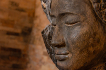 Face front of stone Buddha