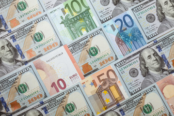 Fototapeta na wymiar Many euro and dollar banknotes