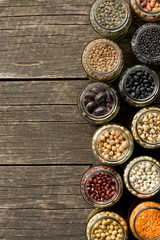 various dried legumes in jars