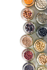 various dried legumes in jars