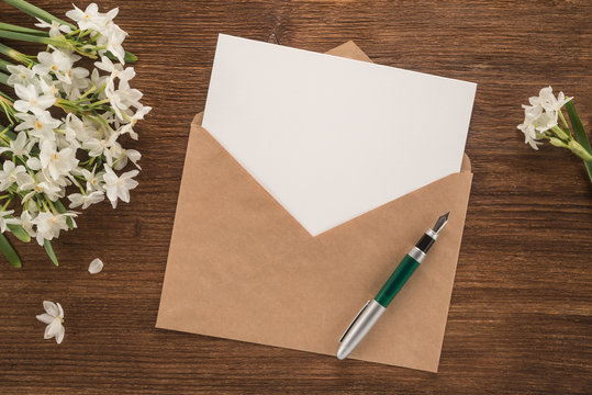  Flowers, envelope and pen 
