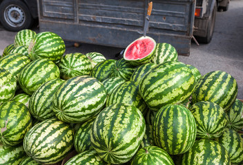 Fresh watermelons for sale at the local farmers market