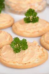 macro crackers with salmon pate and parsley shallow DOF