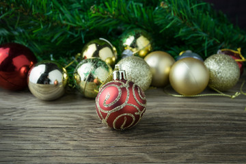 christmas balls on old wooden background for decoration
