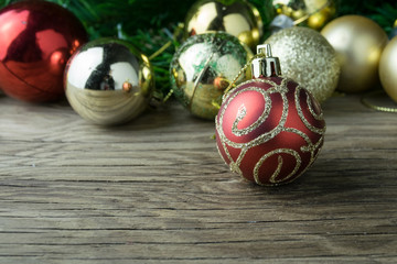 christmas balls on old wooden background for decoration