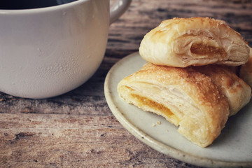 Pineapple pie with coffee cup