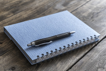 Notebook and pen