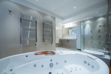 Interior of a luxury bathroom with jacuzzi tub