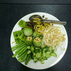 Vegetables eat with rice noodles  in fish curry  from countryside,Thailand.