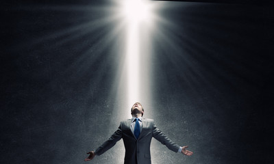 Man standing in light