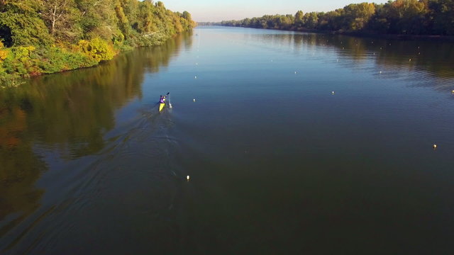 Aerial view of athlete kayaking in rowing canal