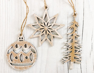 Wooden christmas decoration on wooden background