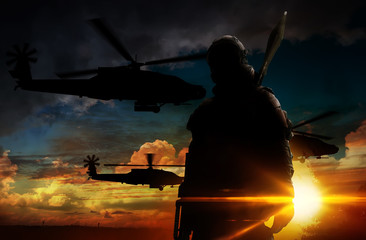 Silhouette of soldier at sunset