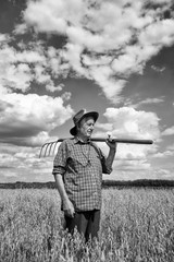 Old man in oat field