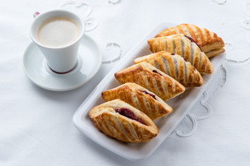 puff pastry with jam on plate