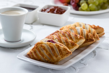 puff pastry with jam on plate