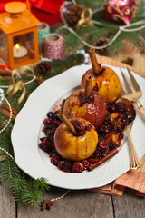 Baked Apples with Cinnamon. Christmas composition. Selective focus.