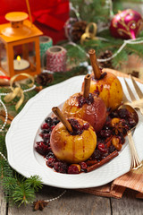 Baked Apples with Cinnamon. Christmas composition. Selective focus.