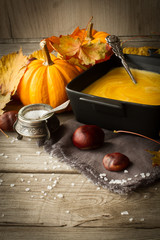 delicious, orange, autumn pumpkin soup. lunch at Halloween