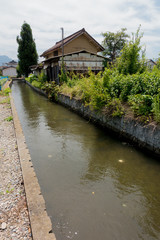 Fototapeta premium Cityscape with a river at a countryside in Japan