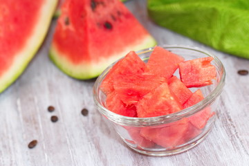Slices of watermelon on the wooden table